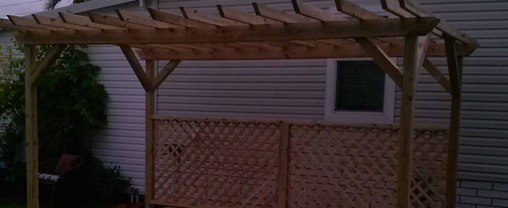 brand new deck made out of pine, with pergola